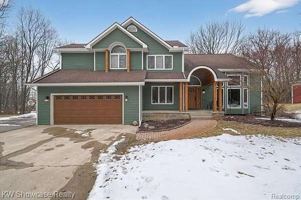 5.53 Acres of Land with Home for Sale in Highland, Michigan