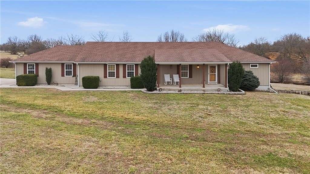 7.2 Acres of Land with Home for Sale in Archie, Missouri