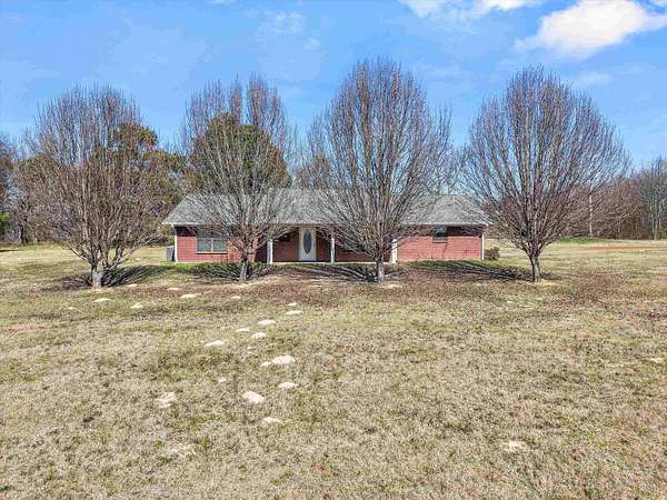 6.2 Acres of Land with Home for Sale in Hughes Springs, Texas