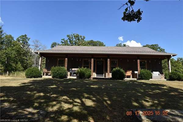 32 Acres of Agricultural Land with Home for Sale in Bunch, Oklahoma