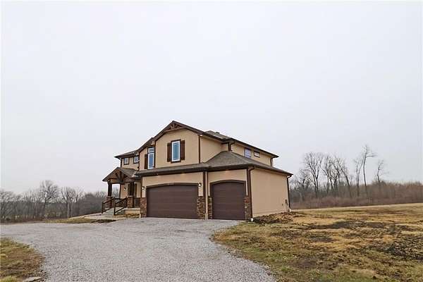 10 Acres of Land with Home for Sale in Harrisonville, Missouri