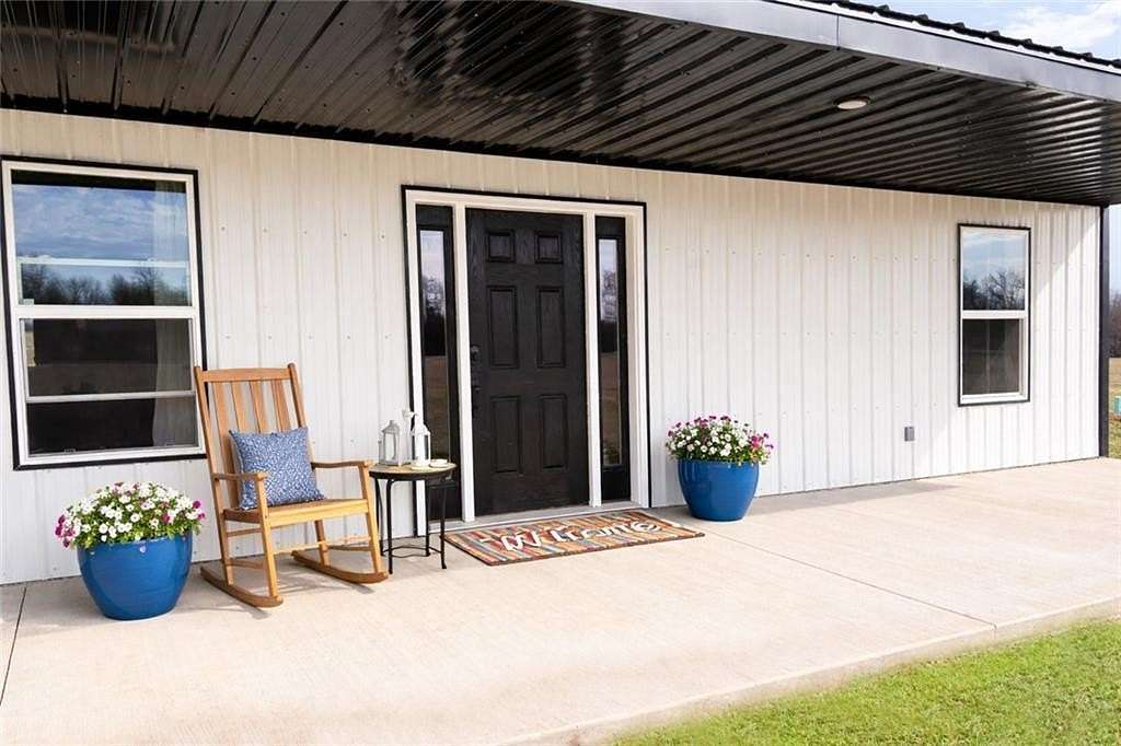 10.2 Acres of Recreational Land with Home for Sale in Chilhowee, Missouri