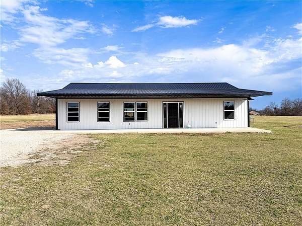 10.2 Acres of Recreational Land with Home for Sale in Chilhowee, Missouri