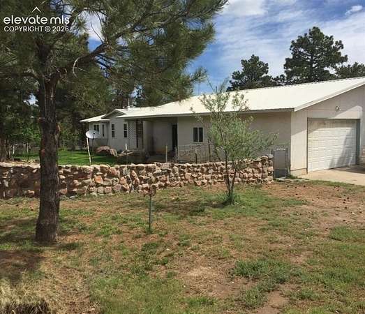 35 Acres of Land with Home for Sale in Florence, Colorado