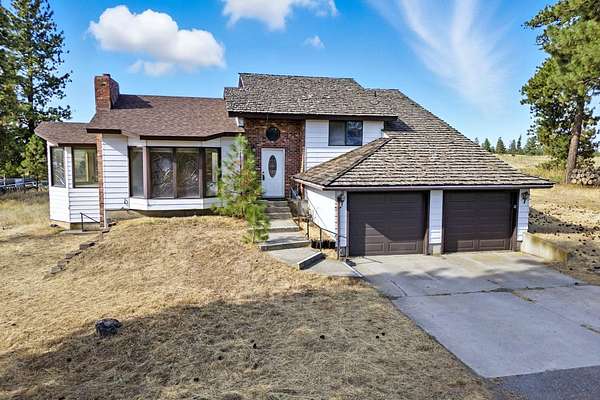 19.3 Acres of Land with Home for Sale in Nine Mile Falls, Washington