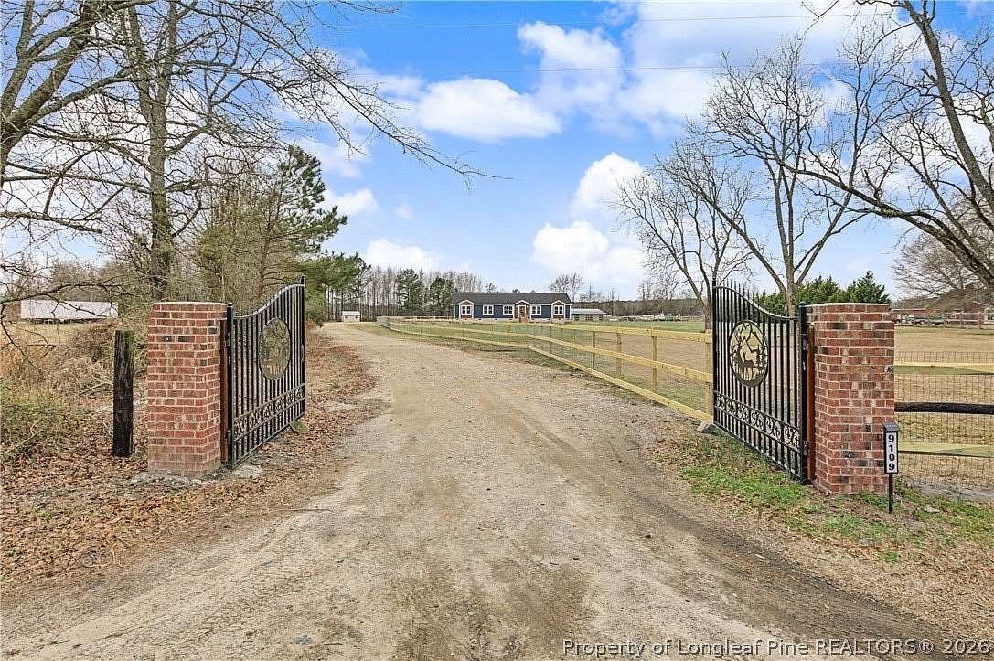 5.66 Acres of Land with Home for Sale in St. Pauls, North Carolina