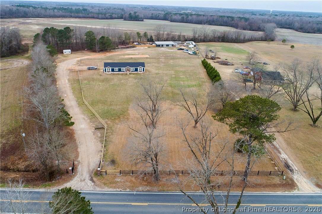 5.66 Acres of Land with Home for Sale in St. Pauls, North Carolina