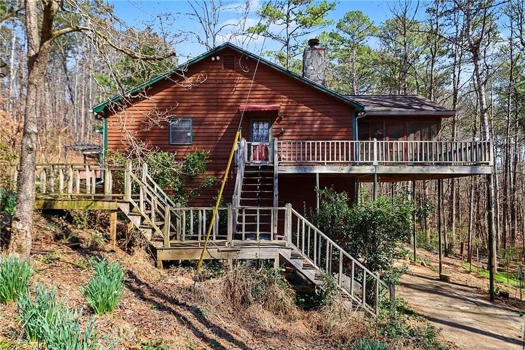 9.89 Acres of Land with Home for Sale in Dallas, Georgia