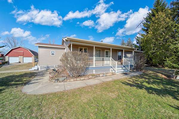 20 Acres of Land with Home for Sale in Hudson, Michigan