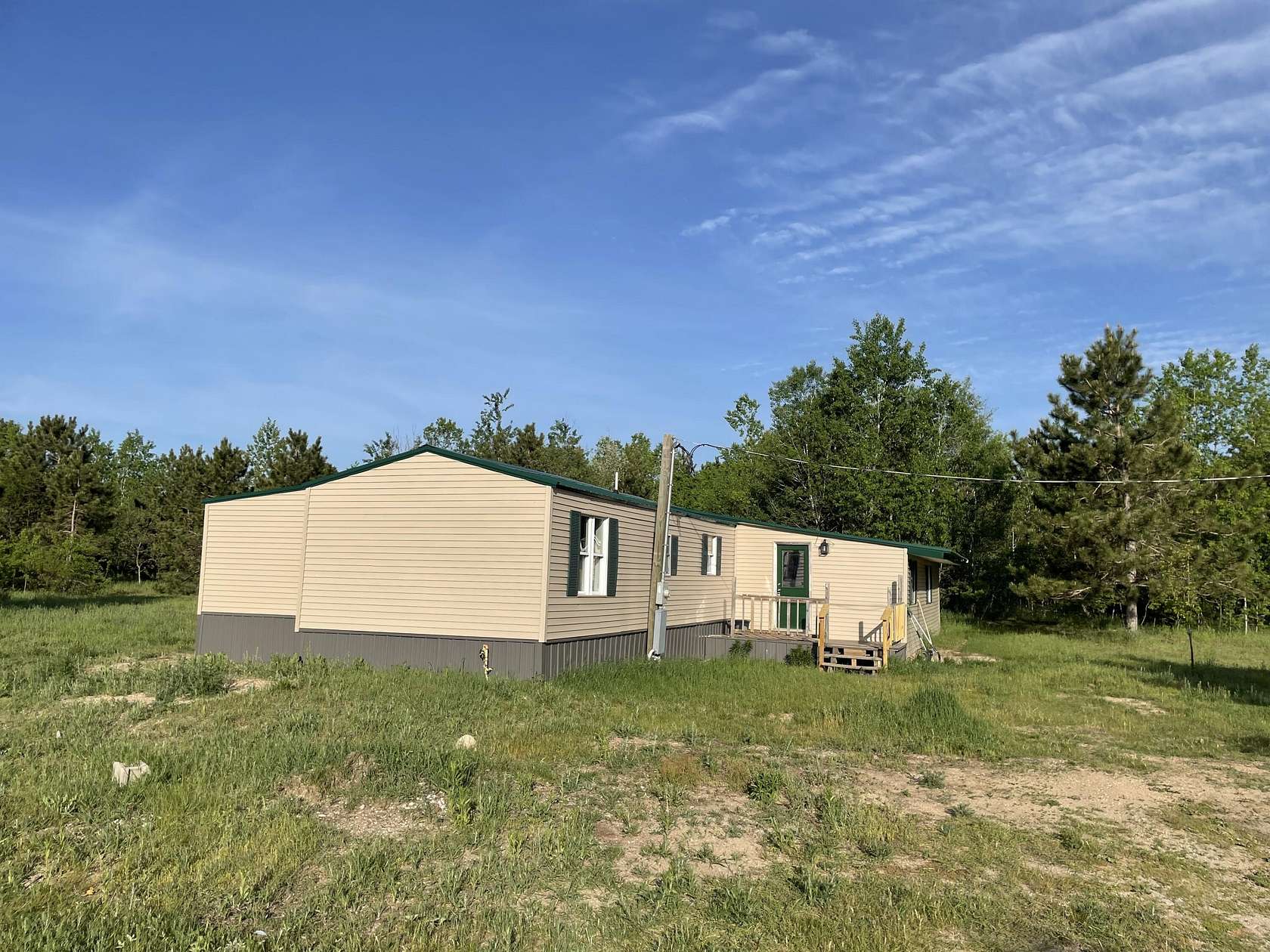 6.1 Acres of Land with Home for Sale in Elmira, Michigan
