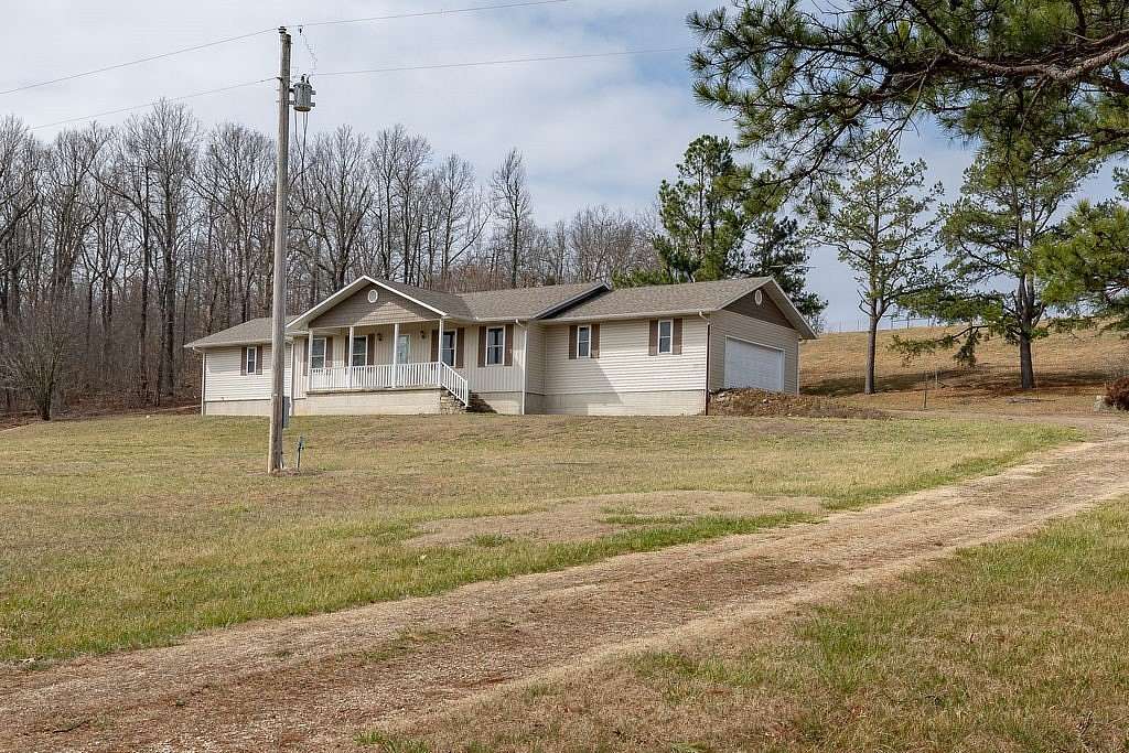 2.89 Acres of Land with Home for Sale in Ponca, Arkansas