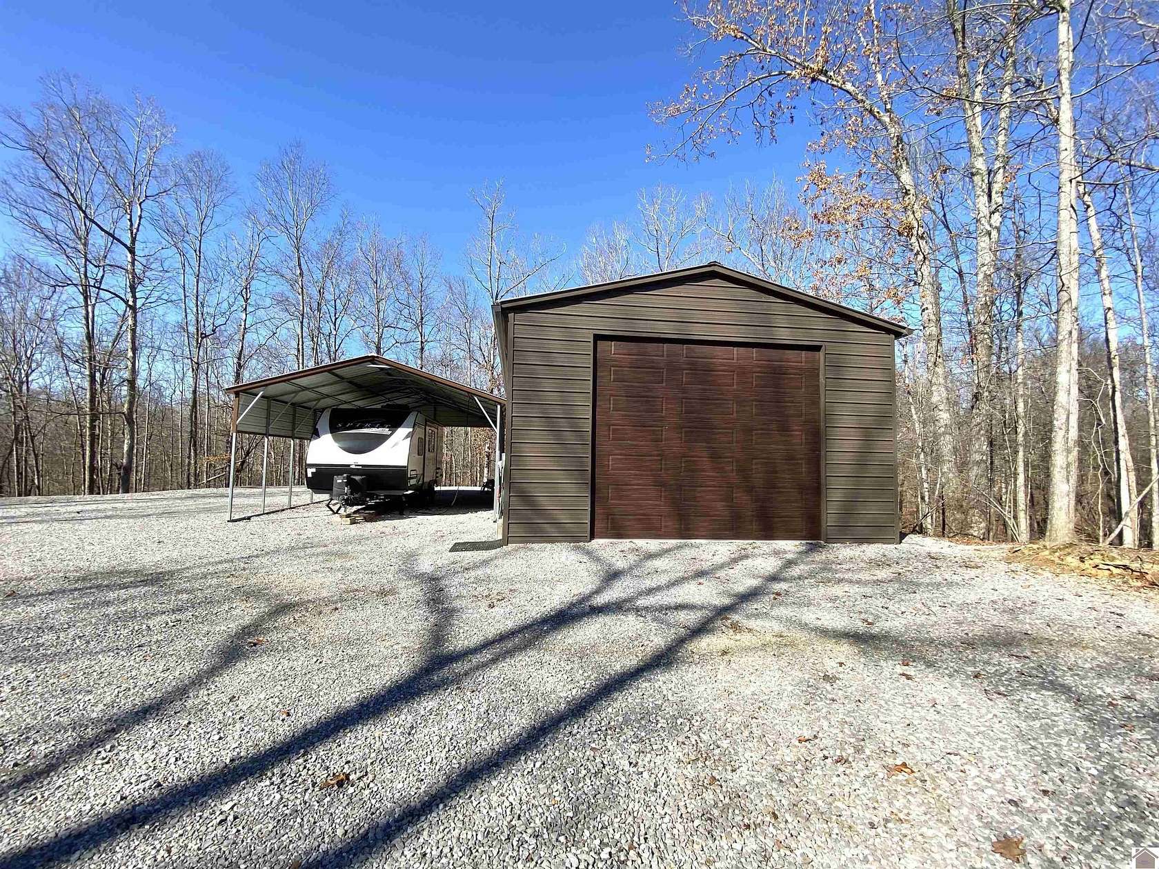 5 Acres of Land with Home for Sale in Kuttawa, Kentucky