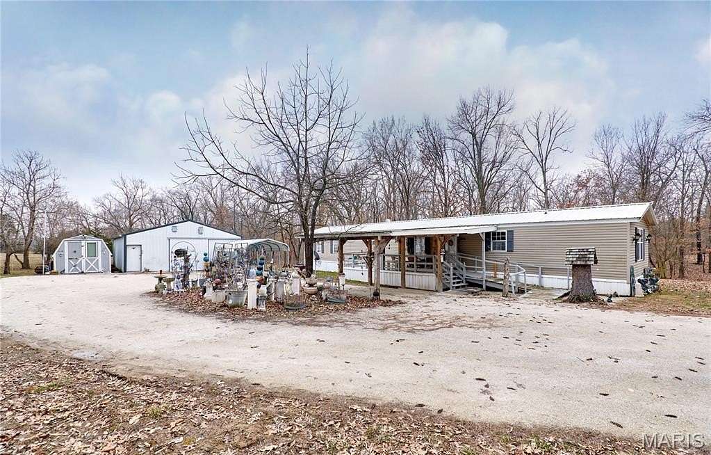4 Acres of Land with Home for Sale in Troy, Missouri