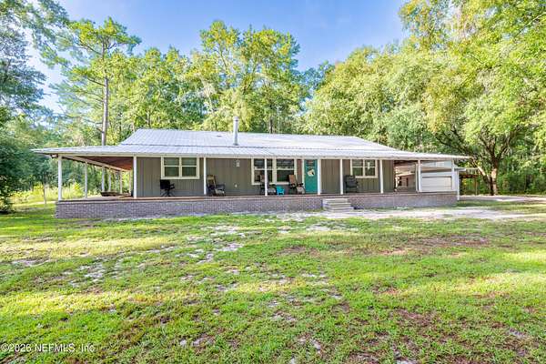 4.18 Acres of Land with Home for Sale in Brooker, Florida