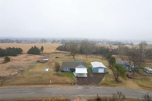 2.84 Acres of Land with Home for Sale in Harrah, Oklahoma