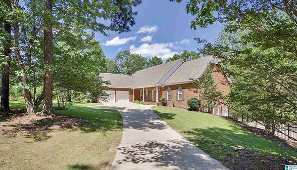 11.7 Acres of Recreational Land with Home for Sale in Columbiana, Alabama