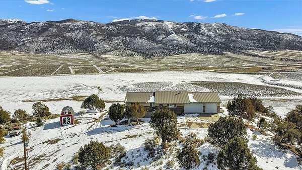 20.5 Acres of Recreational Land with Home for Sale in Burrville, Utah