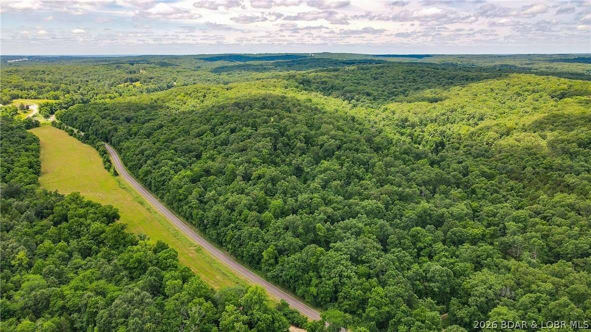 46.5 Acres of Recreational Land with Home for Sale in Versailles, Missouri
