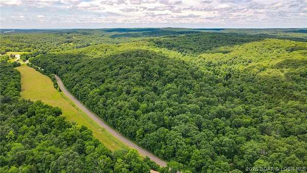 46.5 Acres of Recreational Land with Home for Sale in Versailles, Missouri
