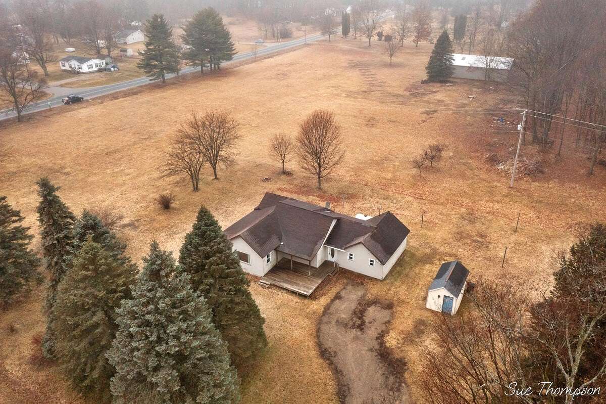 10 Acres of Land with Home for Sale in Coral, Michigan