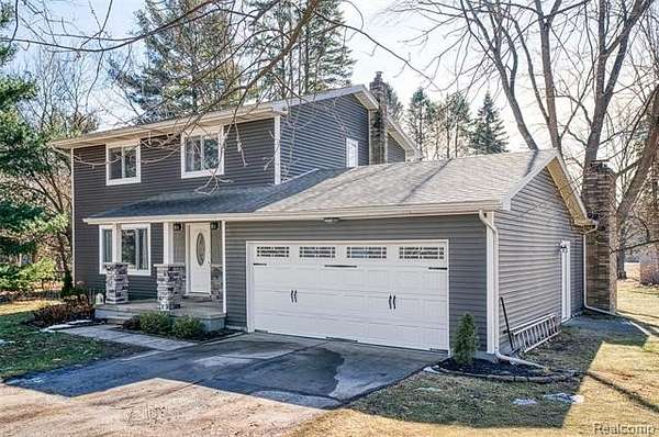 5 Acres of Land with Home for Sale in Fenton, Michigan