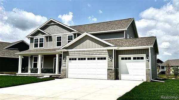 Land with Home for Sale in Marion Township, Michigan
