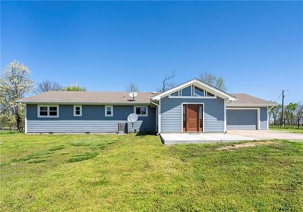 23.5 Acres of Agricultural Land with Home for Sale in Siloam Springs, Arkansas