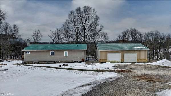 11.5 Acres of Land with Home for Auction in Carrollton, Ohio