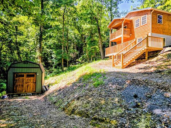 5.15 Acres of Land with Home for Sale in Dandridge, Tennessee