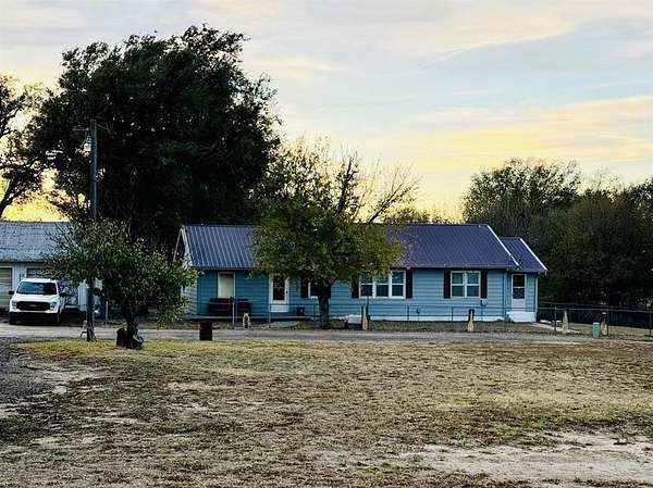 9.2 Acres of Land with Home for Sale in Dodge City, Kansas