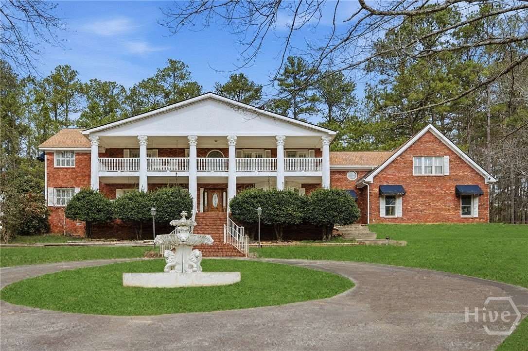 10.9 Acres of Land with Home for Sale in Dacula, Georgia