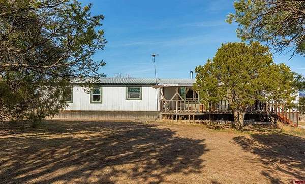 35.6 Acres of Agricultural Land with Home for Sale in Ignacio, Colorado