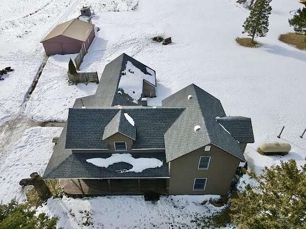 10.1 Acres of Recreational Land with Home for Sale in Herron, Michigan