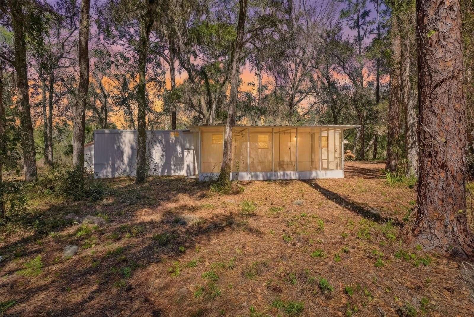 57.4 Acres of Recreational Land with Home for Sale in Astatula, Florida