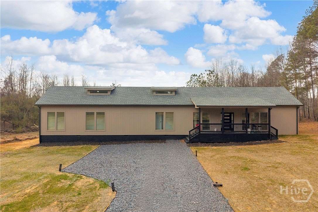 10.7 Acres of Land with Home for Sale in Dewy Rose, Georgia