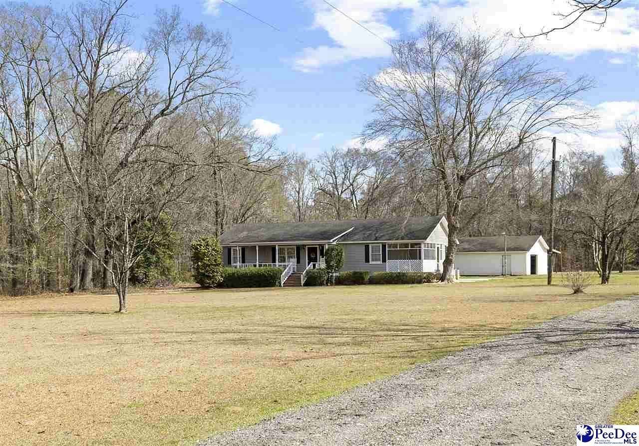 9.4 Acres of Land with Home for Sale in Marion, South Carolina