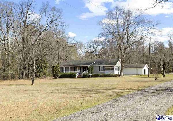 9.4 Acres of Land with Home for Sale in Marion, South Carolina