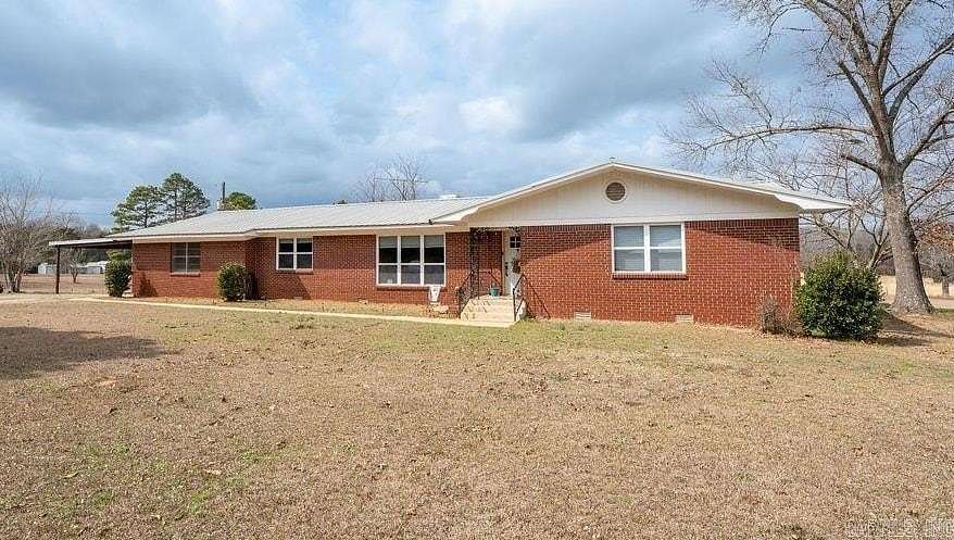4.82 Acres of Land with Home for Sale in Quitman, Arkansas