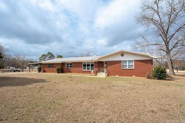 4.82 Acres of Land with Home for Sale in Quitman, Arkansas