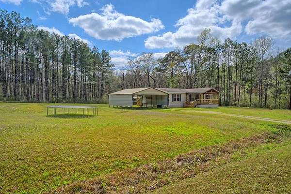 1.7 Acres of Land with Home for Sale in Hemphill, Texas