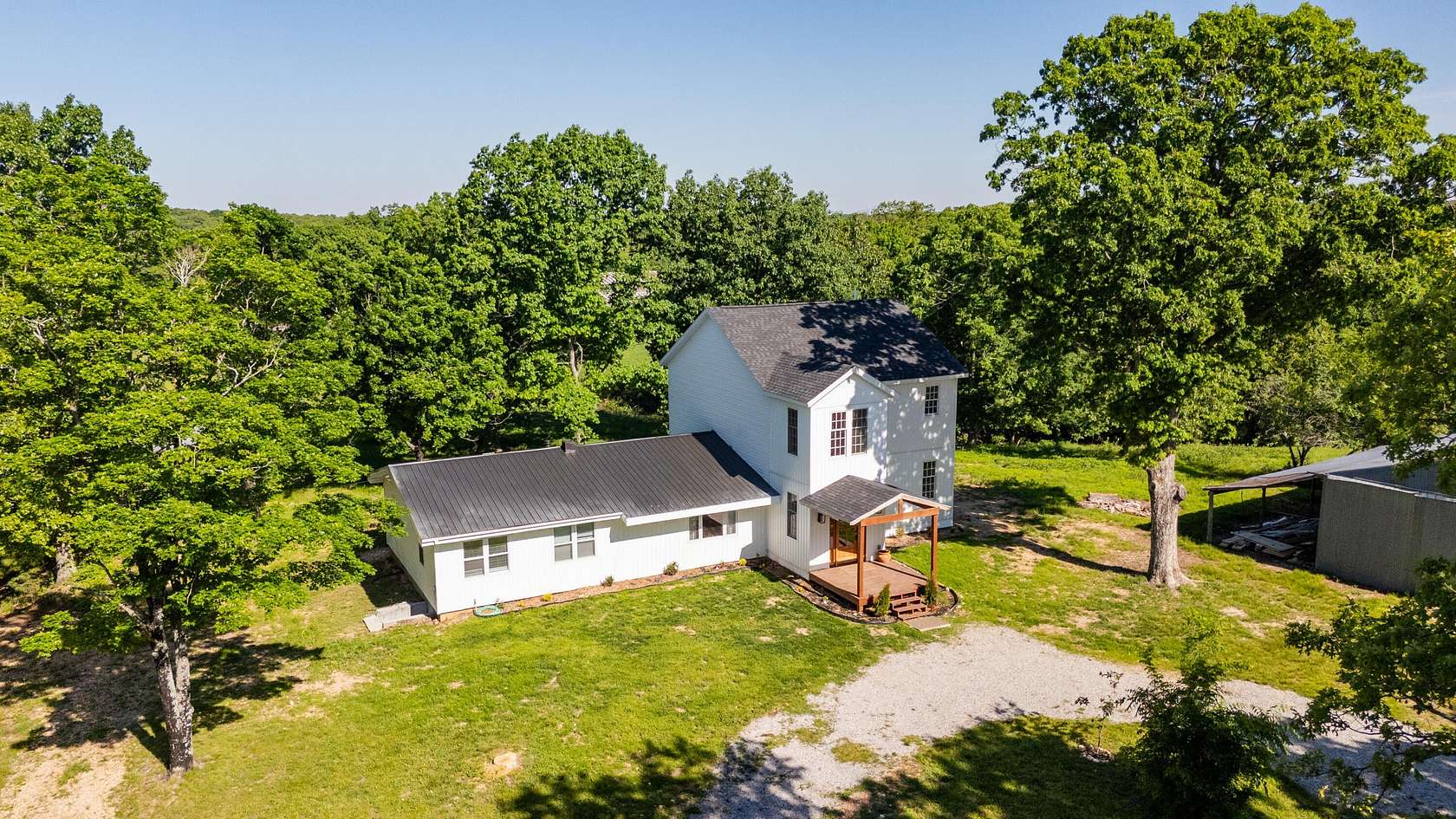 83 Acres of Land with Home for Sale in Rueter, Missouri