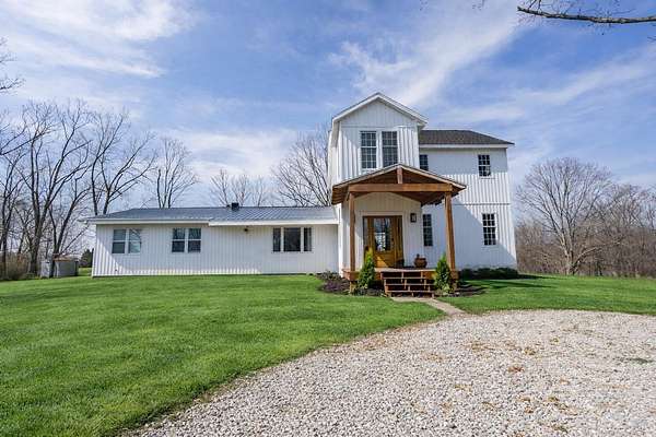 83 Acres of Land with Home for Sale in Rueter, Missouri