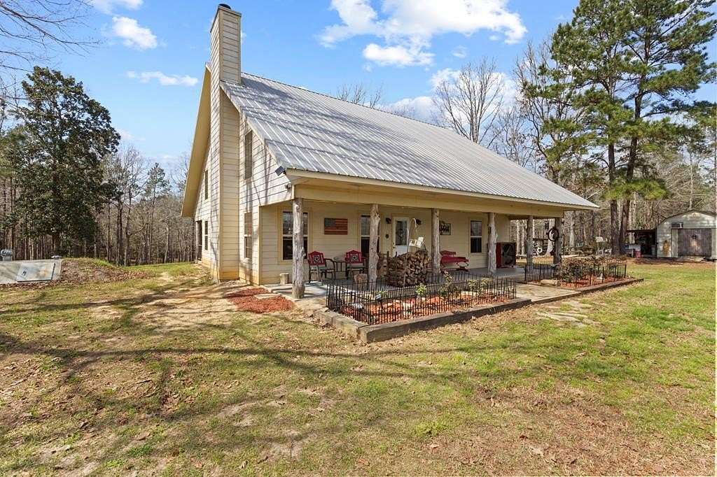 21.2 Acres of Agricultural Land with Home for Sale in Woodville, Texas