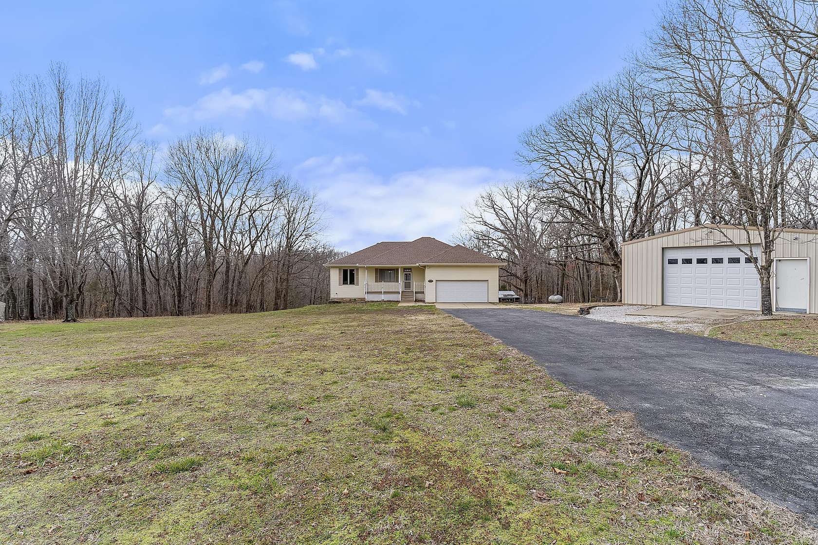 6.69 Acres of Land with Home for Sale in Clever, Missouri