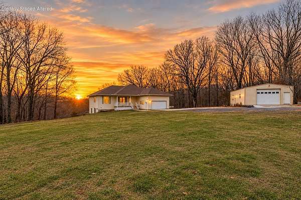 6.69 Acres of Land with Home for Sale in Clever, Missouri