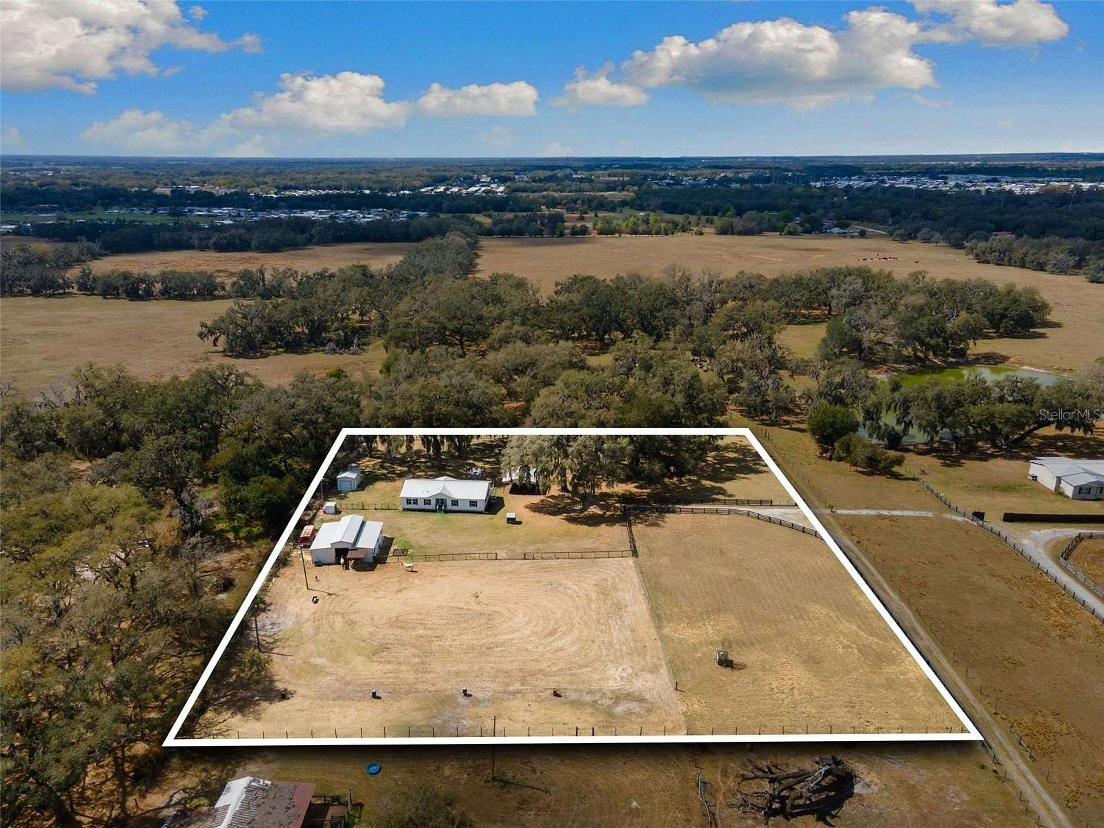3 Acres of Land with Home for Sale in Zephyrhills, Florida