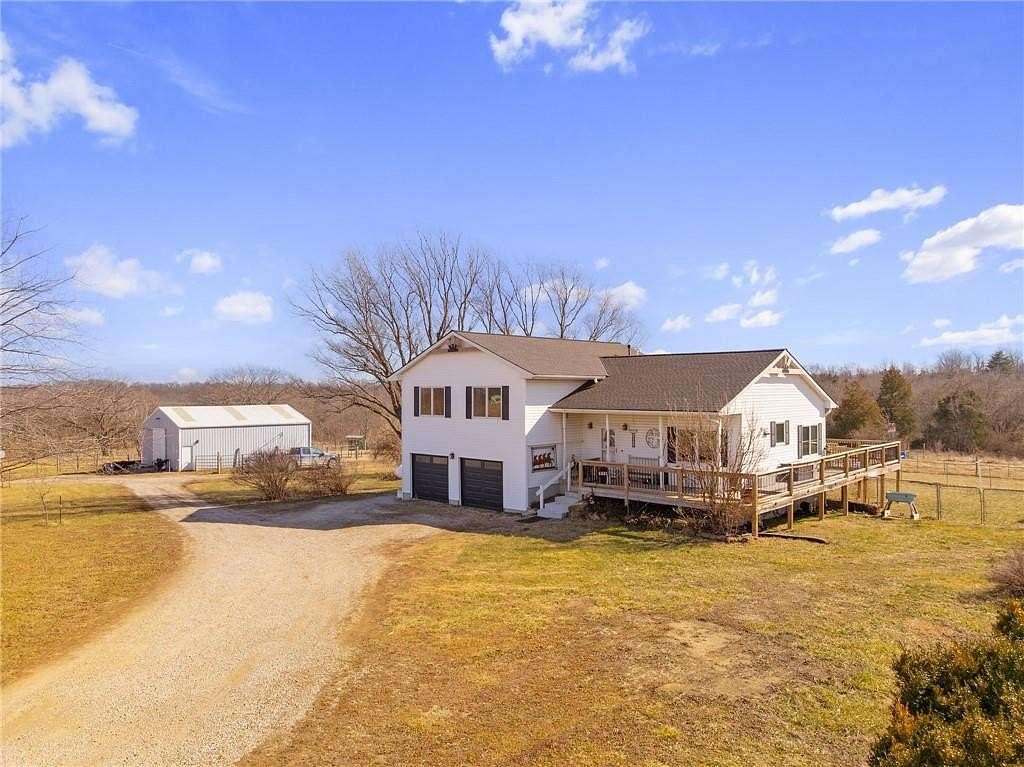 7.5 Acres of Land with Home for Sale in Peculiar, Missouri