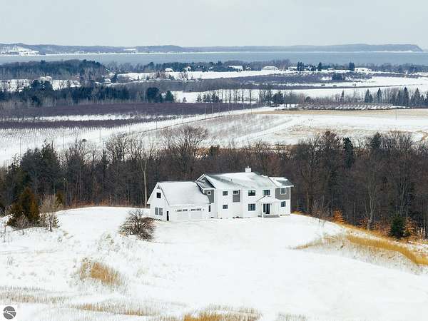 5.58 Acres of Land with Home for Sale in Williamsburg, Michigan