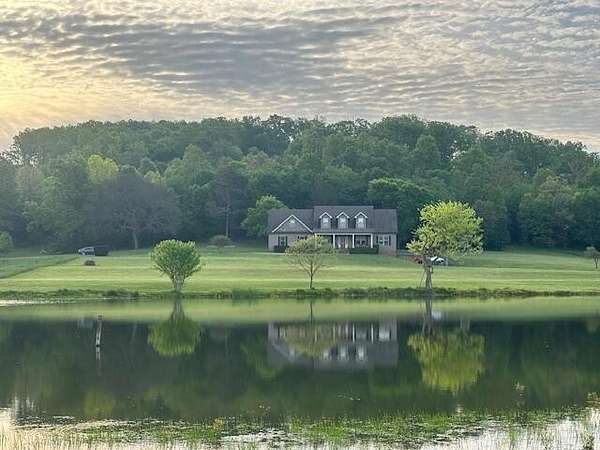 16.7 Acres of Land with Home for Sale in Cleveland, Tennessee