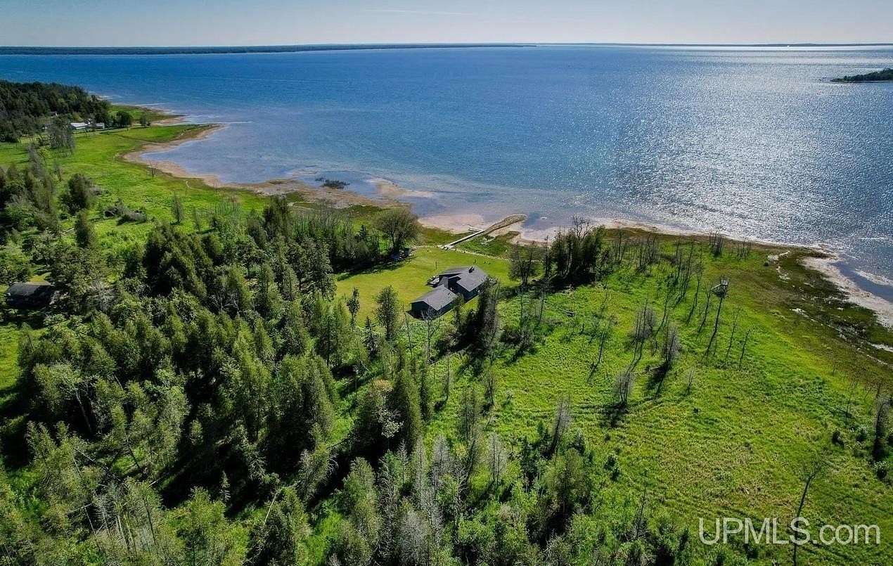 234 Acres of Recreational Land with Home for Sale in Rapid River, Michigan